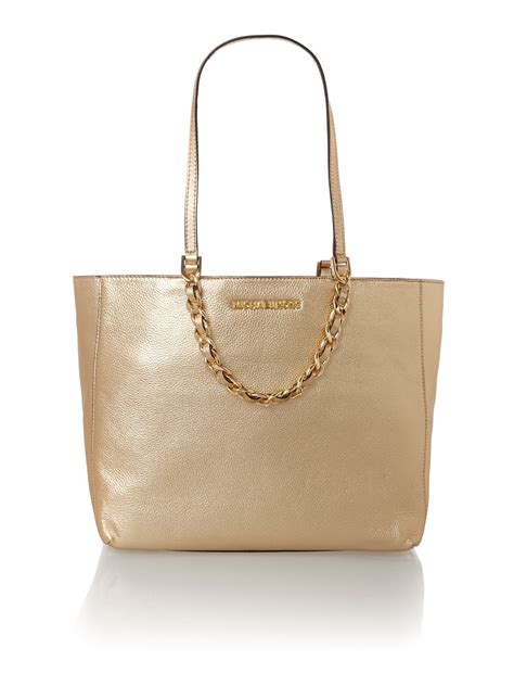 michael kors creme gold bag|Michael Kors gold tote handbags.